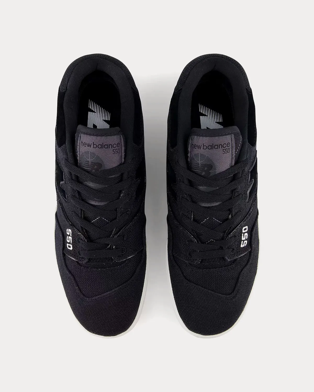 550 Black / White Low Top Sneakers